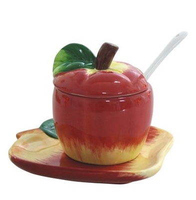 תמונה של כלי לדבש מקרמיקה עם תחתית "תפוח"